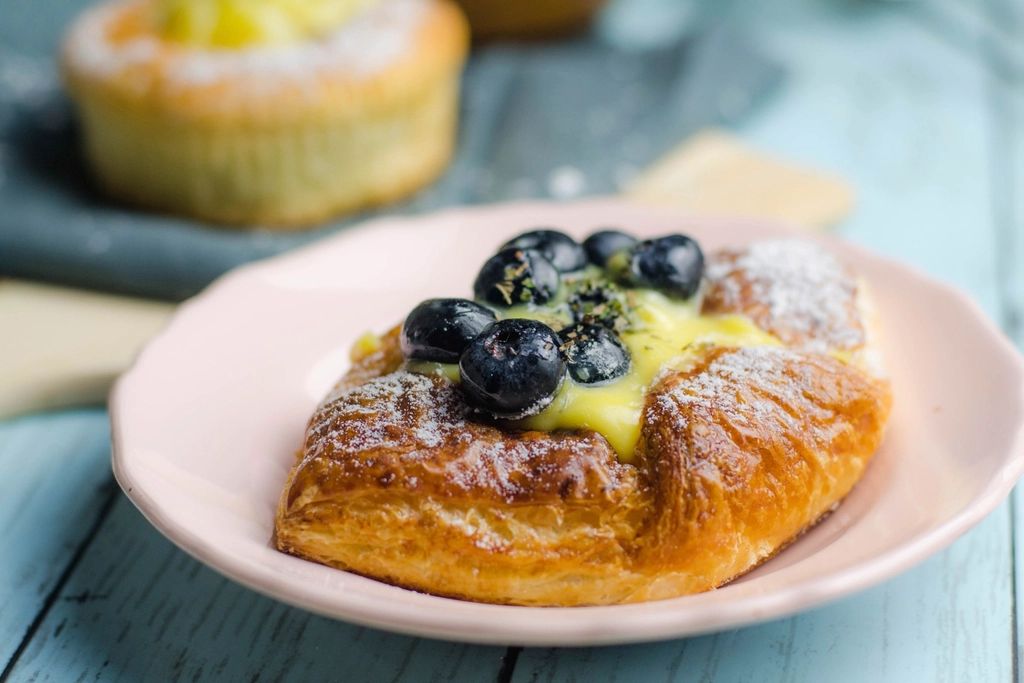 Pastries and coffee on the counter